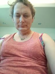 Dewey in Daphne's old raincoat! Can Real Men wear pink? What do you think?? 