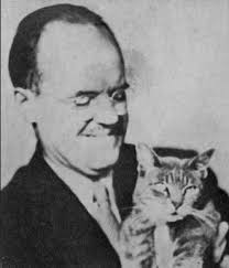 Today's Daily Cartoonist & Cartoon; Review Of Interest: Carol Isaacs's  “Wolf Of Baghdad”; Photo: A Cartoonist & A Kitty