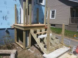 If you use a post base connector with fasteners (bolts or nails) that drive through the post, these fasteners may interfere with the dtt2z bolts. Attaching Bottom Deck Posts Building A Deck Diy Deck Stair Railing Design