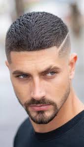 A bun is a type of hairstyle in which the hair is pulled back from the face, twisted or plaited, and wrapped in a circular coil around itself, typically on top or back of the head or just above the neck. What Are Some Great Short Haircuts Hairstyles For Men Quora