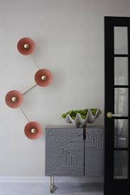 multi focal wall light in brass and blush enamel by blueprint lighting 2019 in 2021 wall lights focal wall traditional interior