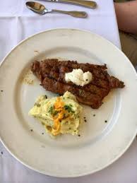 ribeye with blue cheese butter and mashed potatoes picture