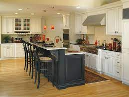 The Contrasting Finishes In This Decora Kitchen Showcase Galleria Cabinets In A Chantille Finish Cottage Kitchen Design Kitchen Island Cabinets Kitchen Trends
