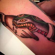 Check spelling or type a new query. The Hand That Bites Snake Handshake Tattoos Tattoodo