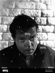 ORSON WELLES as Harry Lime Portrait by LEN LEE for THE THIRD MAN 1949  director CAROL