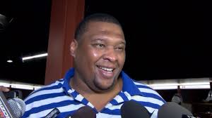 LaMarr Woodley To IR; Cards Sign Red Bryant