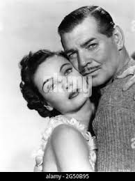 GENE TIERNEY and CLARK GABLE Publicity Portrait in NEVER LET ME GO 1953  director DELMER DAVES from novel Come The Dawn by Paul Winterton producer  Clarence Brown Metro Goldwyn Mayer Stock Photo -
