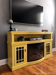 An electric fireplace unit itself cannot be painted. Painted Media Console In Sunshine Yellow By Just The Woods