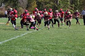 African american tourist talks on the phone. Football Program For Children 5 14 Years Old Norchester Red Knights Youth Football Cheerleading Organization
