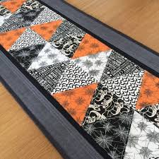 Halloween Table Runner Quilted Table Runner Orange And Black Etsy Halloween Table Runners Halloween Table Decorations Quilted Table Runner