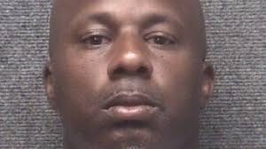 2 men arrested for kidnapping, robbing auto dealer at gunpoint after taking  car