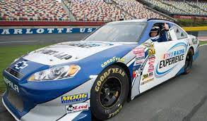 Nascar means standing in the back of a ram with family and watching cars come at you at 170 mph. Charlotte Motor Speedway Nascar Experience Xperience Days