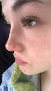 How long should I wait before changing my tongue piercing?