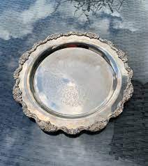 It has engraved plumes , and a pierced pattern around the edges. A Large Vintage Towle Silver Plated Serving Tray With A Floral Boulder La Bellegray