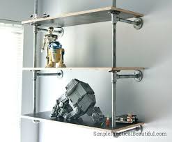 Taking a hint from the given diy, you can design your bookcase in the similar pattern. 14 Fantastic Ways To Make Pipe Shelves Work For Your Home Decor Hometalk