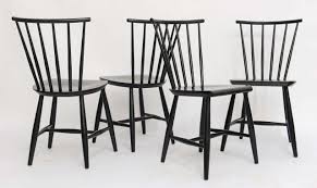 Windsor chairs are perfect as kitchen chairs or dining room chairs. Four 1950s Swedish Windsor Style Spindle Back Dining Chairs At 1stdibs