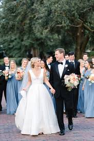 Beautiful Black And Blue Wedding Dresses A Classically Beautiful Wedding Features Bridesmaids In Blue Gowns Groomsmen In Black T Peach Wedding Colors Dusty Blue Bridesmaid Dresses Blue Themed Wedding