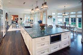Large kitchen island with storage and seating. Size Of Island Vs Table Large Kitchen Layouts Kitchen Design Open Kitchen Island With Sink