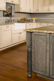 Alder, particularly rustic alder, is frequently ordered with artisan distressing and glaze, as both techniques accentuate the grain pattern and add depth and richness to the color. Stained Knotty Alder Cabinet Houzz