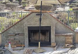 Even if you're an amateur, you can build your own stone fence by following these instructions. How To Build An Outdoor Stacked Stone Fireplace