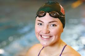 SWIMMING: The Woodlands' Cooke overcomes adversity, reaches Olympic trials