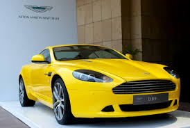 Image result for Sunburst Yellow 2012 Aston Martin