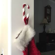 Drill a couple more countersink holes through the small base into the candy cane and secure with 2 1/2″ screws. 3d Printable Candy Cane Stocking Holder By Randy Alexander