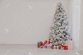 Maybe you would like to learn more about one of these? White Christmas Tree In Konate With Stocking Stuffers 1 Stock Photo Picture And Royalty Free Image Image 133007059