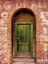 Pin By Lacie Mcdonald On Old Windows Doors Brick Arch Green Door Arched Windows