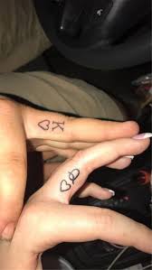 This tattoo symbolizes how both of you lift each other in anything and everything you do. 25 Cute And Stunning Couple Matching Tattoo Designs To Melt Your Heart Women Fashion Lifestyle Blog Shinecoco Com