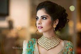 It is a classic bridal hairstyle for the wedding ceremony. 10 Bridal Hairstyle Ideas For Your Reception Look Bridal Beauty Weddingsutra