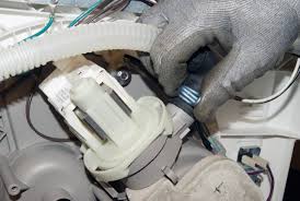 Unscrew and disconnect the electrical connectors on the existing pump before twisting it off of the lugs. How To Replace A Dishwasher Drain Hose Repair Guide