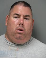 Delaware wrestler put family trauma behind him to wrestle for Navy