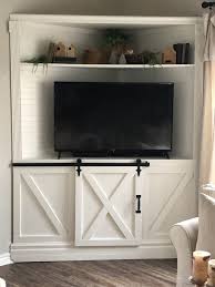 Place a tv inside the open corner cabinet! Creating A Corner Tv Cabinet Hip Humble Style