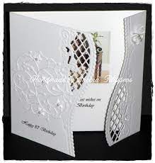 Use rhinestones to make the greeting card extra special. Cardmaking Chaos White On White Marianne Design Cards Embossed Cards Pinterest Cards