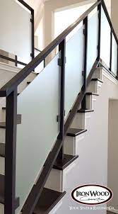 Glass And Wrought Iron Systems Are Designed Through Our Custom Staircase Services This Stai Staircase Railing Design Stair Railing Design Modern Stair Railing