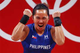 Hidilyn diaz weighed around 56.28 kg during her first olympic campaign, making her the come 2012 olympics, hidilyn diaz increased her weight to 57.70 kg but still struggled making it to the top half of. Hidilyn Diaz Wins First Olympic Gold For Philippines