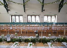 Our Wedding At Willaston Memorial Hall Wirral Eucalyptus White Roses Vintage Bottles And Brass Candlesticks On The Tables Wedding Hall Decor Budget Wedding