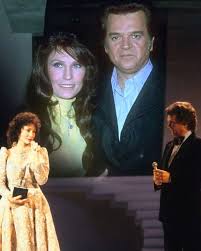 THE NIGHT A NEWSPAPER STORY CHANGED THE WAY CONWAY TWITTY SANG 'GOODBYE TIME.'”  Hours before Conway Twitty stepped onto the TNN stage in 1988, someone slid  a folded newspaper across his dressing