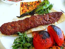 Adana Kebab Which Originated From Turkey Is Typically Served With Rice Or Made Into A Tight Wrap Made With Turkish Lavash Th Kebab Lamb Kebabs Turkish Recipes