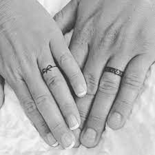 Husband And Wife Wedding Band Tattoos Wedding Band Tattoo Tattoo Wedding Rings Wedding Ring Tattoo