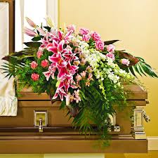 The best casket flowers for men are those that you choose personally it's perhaps best to avoid pinks and lavenders for a man's coffin as they would perhaps look rather too feminine. In Her Honor Casket Spray Casket Flowers The Sympathy Store