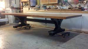 Table has circle shape and is made of dark, elegant wood. Custom Extra Large Family Dining Table By Puddle Town Woodworking Custommade Com