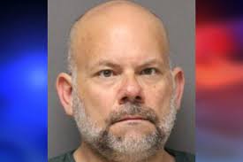 NJ man Kyle Banner loses teaching license over lewd work selfies