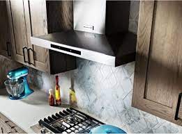 Will an exhaust fan in reverse work to cool down the room? Range Hoods