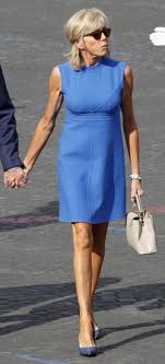 France's first lady, 66, looked stylish in a sky blue coat worn. Style Analysis Brigitte Macron Fabrickated