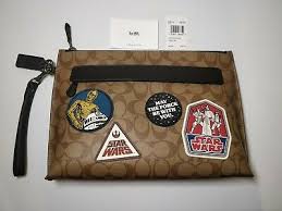 It will be available online nov. Star Wars X Coach Carryall Pouch In Signature Canvas With Patches Limited 328 149 00 Picclick