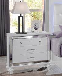 The silver embossed finish and mirror trim give each piece a glitzy look, while led lighting in the upholstered headboard and dresser mirror. Valentino Bedroom Set 5pc B9698w In White By Ncfurniture