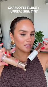 Charlotte Tilbury Unreal Skin vs Hollywood Flawless Filter.  #charlottetilbury #skintint #glowymakeup #glowingskin