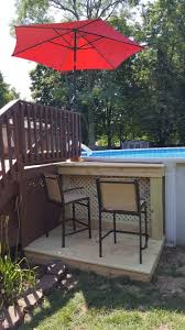The Umbrella Was Purchased At Meijer And Features Solar Powered Leds At Night It Really Livens Up Whole Project Was A Backyard Pool Backyard Remodel Backyard
